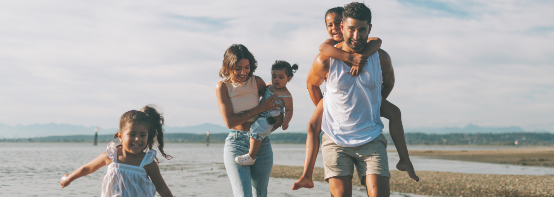 A family playing on a Spanish beach